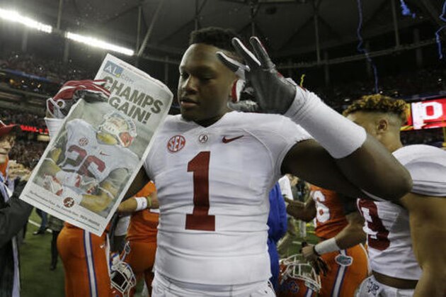 Alabama wide receiver Robert Foster celebrates after the Southeastern Conference championship NCAA college football game between Alabama and Florida, Saturday, Dec. 3, 2016, in Atlanta. Alabama won 54-16. (AP Photo/Butch Dill)