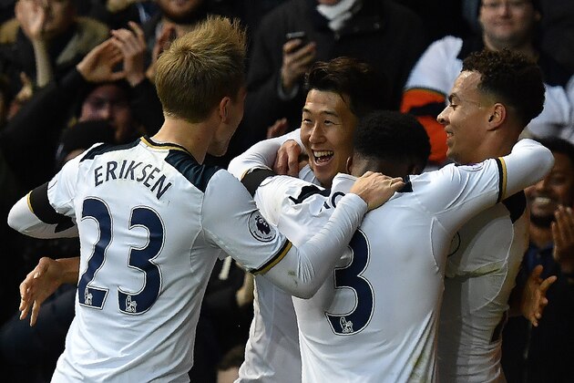 Tottenham Hotspur's South Korean striker Son Heung-Min (C) celebrates scoring his team's second goal with Tottenham Hotspur's Argentinian midfielder Tottenham Hotspur's Danish midfielder Christian Eriksen (L) Tottenham Hotspur's English defender Danny Rose and Tottenham Hotspur's English midfielder Dele Alli during the English Premier League football match between Tottenham Hotspur and Swansea City at White Hart Lane in London, on December 3, 2016. / AFP / Ben STANSALL / RESTRICTED TO EDITORIAL USE. No use with unauthorized audio, video, data, fixture lists, club/league logos or 'live' services. Online in-match use limited to 75 images, no video emulation. No use in betting, games or single club/league/player publications.  /         (Photo credit should read BEN STANSALL/AFP/Getty Images)