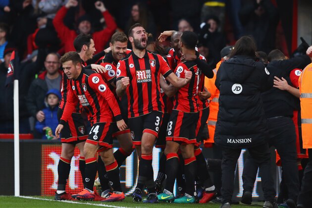 BOURNEMOUTH, ENGLAND - DECEMBER 04:  Steve Cook of AFC Bournemouth (3) celebrates with team mates as Nathan Ake of AFC Bournemouth scores their fourth goal during the Premier League match between AFC Bournemouth and Liverpool at Vitality Stadium on December 4, 2016 in Bournemouth, England.  (Photo by Michael Steele/Getty Images)