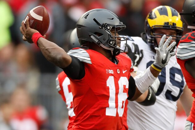 COLUMBUS, OH - NOVEMBER 26:   J.T. Barrett #16 of the Ohio State Buckeyes throws a pass during the fourth quarter against the Michigan Wolverines at Ohio Stadium on November 26, 2016 in Columbus, Ohio.  (Photo by Gregory Shamus/Getty Images)