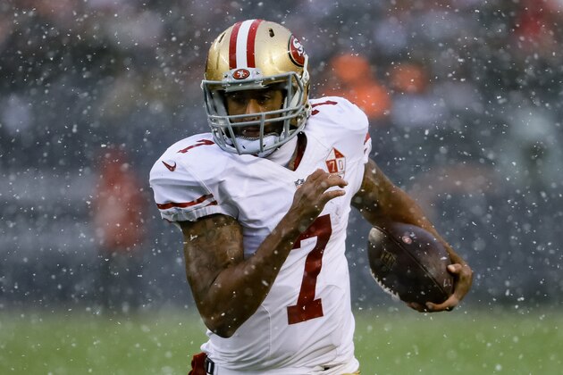 CHICAGO, IL - DECEMBER 04:  Quarterback Colin Kaepernick #7 of the San Francisco 49ers runs with the football in the second quarter against the Chicago Bears at Soldier Field on December 4, 2016 in Chicago, Illinois.  (Photo by Jonathan Daniel/Getty Images)