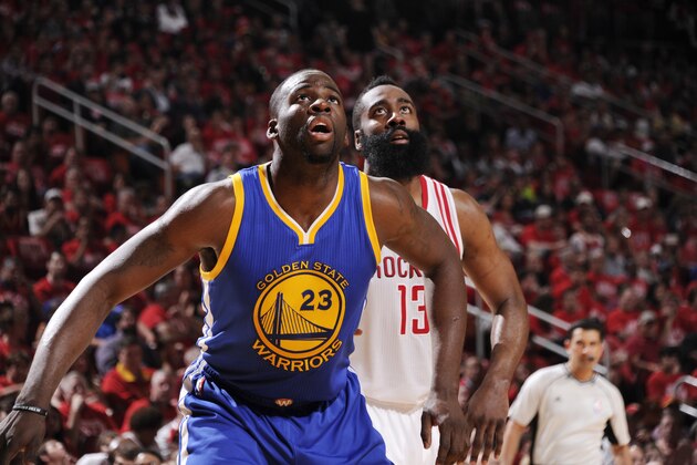 HOUSTON, TX - APRIL 24:  Draymond Green #23 of the Golden State Warriors boxes out against James Harden #13 of the Houston Rockets in Game Four of the Western Conference Quarterfinals during the 2016 NBA Playoffs on April 24, 2016 at the Toyota Center in Houston, Texas. NOTE TO USER: User expressly acknowledges and agrees that, by downloading and or using this photograph, User is consenting to the terms and conditions of the Getty Images License Agreement. Mandatory Copyright Notice: Copyright 2016 NBAE (Photo by Bill Baptist/NBAE via Getty Images)