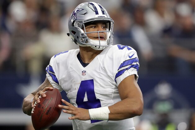 ARLINGTON, TX - NOVEMBER 20:   Dak Prescott #4 of the Dallas Cowboys drops back to pass against the Baltimore Ravens at AT&T Stadium on November 20, 2016 in Arlington, Texas.  (Photo by Ronald Martinez/Getty Images)
