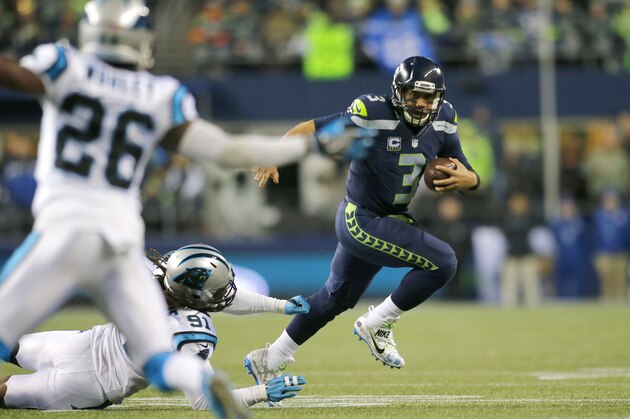 SEATTLE, WA - DECEMBER 04:  Quarterback Russell Wilson #3 of the Seattle Seahawks rushes against the Carolina Panthers at CenturyLink Field on December 4, 2016 in Seattle, Washington.  (Photo by Jonathan Ferrey/Getty Images)