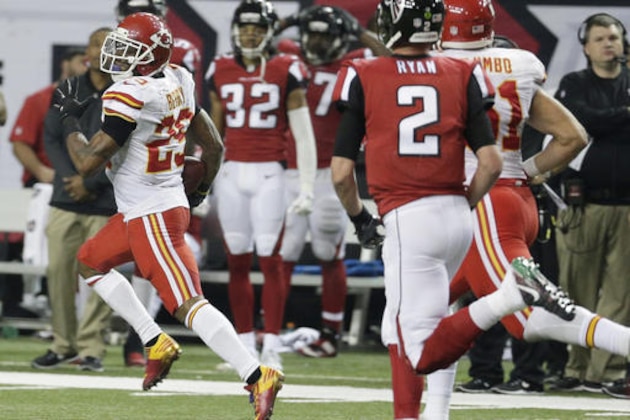 Kansas City Chiefs strong safety Eric Berry (29) runs back an intercepted ball from a Atlanta Falcons two-point conversion during the second half of an NFL football game, Sunday, Dec. 4, 2016, in Atlanta. (AP Photo/Chuck Burton)