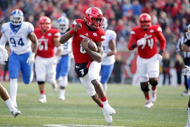 LOUISVILLE, KY - NOVEMBER 26:  Lamar Jackson #8 of the Louisville Cardinals runs with the ball during the game against the Kentucky Wildcats at Papa John's Cardinal Stadium on November 26, 2016 in Louisville, Kentucky.  (Photo by Andy Lyons/Getty Images)