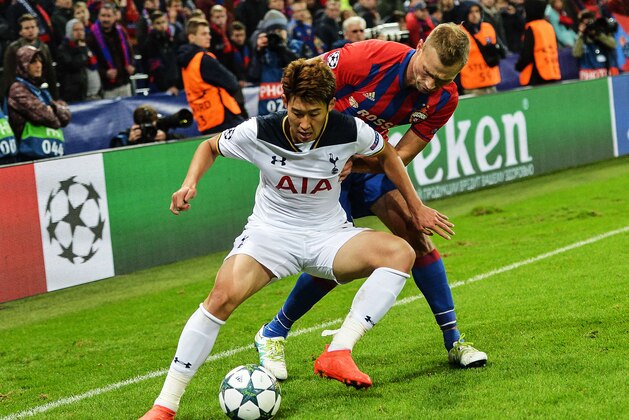 MOSCOW, RUSSIA - SEPTEMBER 27: Aleksei Berezutski of CSKA Moscow vies for the ball with Heung-Min Son of Tottenham Hotspur FC during the UEFA Champions League match between PFC CSKA Moskva and Tottenham Hotspur FC at    the CSKA Arena stadium on September 27, 2016 in Moscow. (Photo by Epsilon/Getty Images)