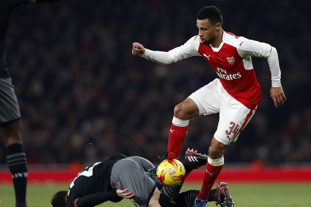 Arsenal's French midfielder Francis Coquelin (R) vies with Southampton's Danish midfielder Pierre-Emile Hojbjerg during the EFL (English Football League) Cup quarter-final football match between Arsenal and Southampton at the Emirates Stadium in London on November 30, 2016.  / AFP / Adrian DENNIS / RESTRICTED TO EDITORIAL USE. No use with unauthorized audio, video, data, fixture lists, club/league logos or 'live' services. Online in-match use limited to 75 images, no video emulation. No use in betting, games or single club/league/player publications.  /         (Photo credit should read ADRIAN DENNIS/AFP/Getty Images)