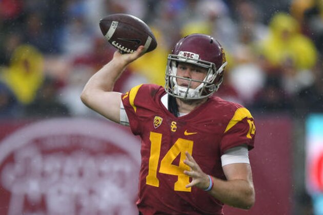 Southern California quarterback Sam Darnold passes during the first half of an NCAA college football game against Notre Dame, Saturday, Nov. 26, 2016, in Los Angeles. (AP Photo/Mark J. Terrill)