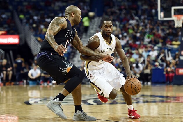 NEW ORLEANS, LA - APRIL 09:  Toney Douglas #16 of the New Orleans Pelicans works against P.J. Tucker #17 of the Phoenix Suns during a game at Smoothie King Center on April 9, 2016 in New Orleans, Louisiana. NOTE TO USER: User expressly acknowledges and agrees that, by downloading and or using this photograph, User is consenting to the terms and conditions of the Getty Images License Agreement.  (Photo by Stacy Revere/Getty Images)