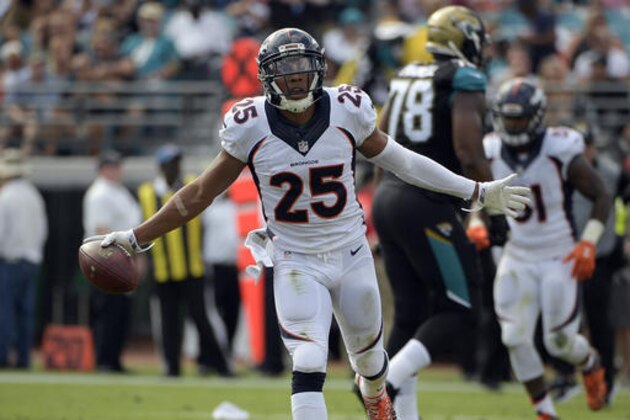 Denver Broncos cornerback Chris Harris (25) celebrates after intercepting a pass against the Jacksonville Jaguars during the first half of an NFL football game in Jacksonville, Fla., Sunday, Dec. 4, 2016. (AP Photo/Phelan M. Ebenhack)