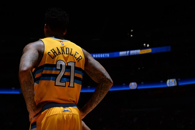 DENVER, CO - DECEMBER 2: Wilson Chandler #21 of the Denver Nuggets looks on during the game against the Houston Rockets on December 2, 2016 at the Pepsi Center in Denver, Colorado. NOTE TO USER: User expressly acknowledges and agrees that, by downloading and/or using this Photograph, user is consenting to the terms and conditions of the Getty Images License Agreement. Mandatory Copyright Notice: Copyright 2016 NBAE (Photo by Bart Young/NBAE via Getty Images)