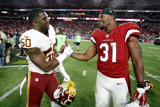 GLENDALE, AZ - DECEMBER 04:  David Johnson #31 of the Arizona Cardinals shakes hands with Martrell Spaight #50 of the Washington Redskins following a game at University of Phoenix Stadium on December 4, 2016 in Glendale, Arizona.  The Cardinals defeated the Redskins 31-23. (Photo by Ralph Freso/Getty Images)