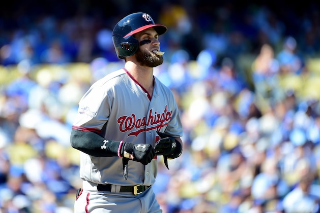 LOS ANGELES, CA - OCTOBER 10:  Bryce Harper #34 of the Washington Nationals reacts after he walks in the first inning against the Los Angeles Dodgers in game three of the National League Division Series at Dodger Stadium on October 10, 2016 in Los Angeles, California.  (Photo by Harry How/Getty Images)