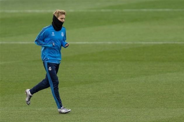 Real Madrid's B player Martin Odegaard from Norway runs during a training session in Valdebebas stadium in Madrid, Spain, Monday, Dec. 7, 2015. Real Madrid will face Malmo FF in a Champion's League Group A soccer match on Tuesday.(AP Photo/Daniel Ochoa de Olza)