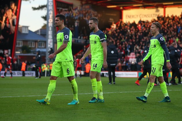 BOURNEMOUTH, ENGLAND - DECEMBER 04: A dejected looking Dejan Lovren, Jordan Henderson and Lucas Leiva of Liverpool trudge off at the end of the Premier League match between AFC Bournemouth and Liverpool at Vitality Stadium on December 4, 2016 in Bournemouth, England. (Photo by Catherine Ivill - AMA/Getty Images)