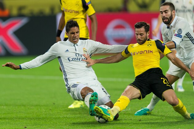 Dortmund, Germany 27.09.2016, UEFA Champions League - 2016/17 Season, Group F - Matchday 2, BV Borussia Dortmund - Real Madrid, 2:2,  Raphael Varane (Real Madrid) gegen Gonzalo Castro (BVB), Daniel Carvajal (Real Madrid)   (Photo by TF-Images/Getty Images)