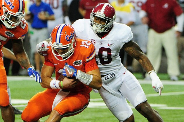 ATLANTA, GA - DECEMBER 03:  Austin Appleby #12 of the Florida Gators is sacked by Reuben Foster #10 of the Alabama Crimson Tide in the first quarter during the SEC Championship game at the Georgia Dome on December 3, 2016 in Atlanta, Georgia.  (Photo by Scott Cunningham/Getty Images)