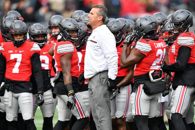 COLUMBUS, OH - NOVEMBER 26:   Head coach Urban Meyer of the Ohio State Buckeyes warms up his team on the field prior to the game against the Michigan Wolverines at Ohio Stadium on November 26, 2016 in Columbus, Ohio.  (Photo by Jamie Sabau/Getty Images)