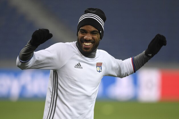 Lyon's French forward Alexandre Lacazette gestures during a training session at the Parc Olympique Lyonnais in Décines-Charpieu near Lyon, southeastern France, on December 6, 2016, on the eve of the UEFA Champions League group H football match Olympique Lyonnais against FC Seville.    / AFP / PHILIPPE DESMAZES        (Photo credit should read PHILIPPE DESMAZES/AFP/Getty Images)