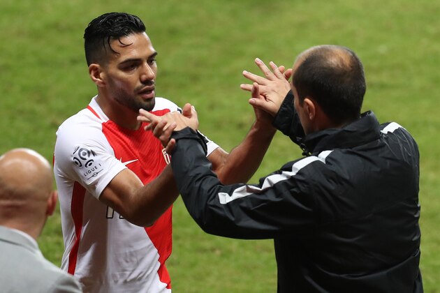 Monaco's Colombian forward Radamel Falcao (L) speaks with Monaco's Portuguese coach Leonardo Jardim (R) during the French L1 football match Monaco (ASM) vs Nancy (ASNL) on November 5, 2016 at the 'Louis II Stadium' in Monaco.   / AFP / VALERY HACHE        (Photo credit should read VALERY HACHE/AFP/Getty Images)