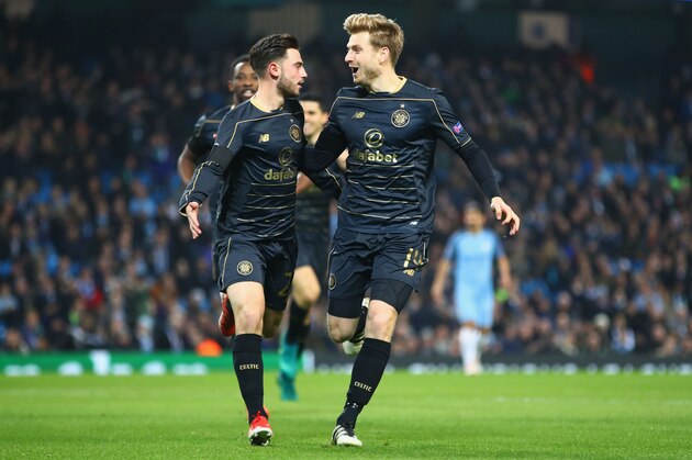 MANCHESTER, ENGLAND - DECEMBER 06: Patrick Roberts of Celtic (L) celebrates scoring his sides first goal with Stuart Armstrong of Celtic (R) during the UEFA Champions League Group C match between Manchester City FC and Celtic FC at Etihad Stadium on December 6, 2016 in Manchester, England.  (Photo by Clive Brunskill/Getty Images)