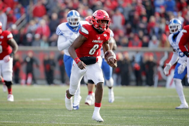 LOUISVILLE, KY - NOVEMBER 26:  Lamar Jackson #8 of the Louisville Cardinals runs with the ball during the game against the Kentucky Wildcats at Papa John's Cardinal Stadium on November 26, 2016 in Louisville, Kentucky.  (Photo by Andy Lyons/Getty Images)