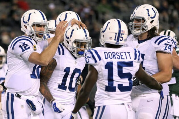 Indianapolis Colts quarterback Andrew Luck, left, celebrates with wide receiver Donte Moncrief (10) after the two connected for a touchdown pass during the second half of an NFL football game against the New York Jets, Monday, Dec. 5, 2016, in East Rutherford, N.J. (AP Photo/Seth Wenig)
