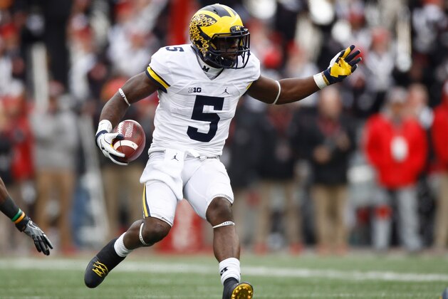 COLUMBUS, OH - NOVEMBER 26:   Jabrill Peppers #5 of the Michigan Wolverines runs after intercepting a pass from J.T. Barrett #16 of the Ohio State Buckeyes during the second half of their game at Ohio Stadium on November 26, 2016 in Columbus, Ohio.  (Photo by Gregory Shamus/Getty Images)