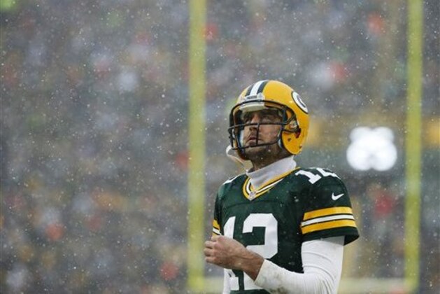 Green Bay Packers' Aaron Rodgers looks up during the second half of an NFL football game against the Houston Texans Sunday, Dec. 4, 2016, in Green Bay, Wis. (AP Photo/Mike Roemer)