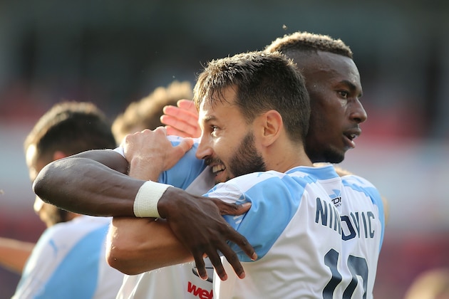 NEWCASTLE, AUSTRALIA - DECEMBER 04:  Bernie Ibini-Isei of Sydney FC and team mate Milos Ninkovic celebrate a goal during the round nine A-League match between the Newcastle Jets and Sydney FC at McDonald Jones Stadium on December 4, 2016 in Newcastle, Au  (Photo by Tony Feder/Getty Images)