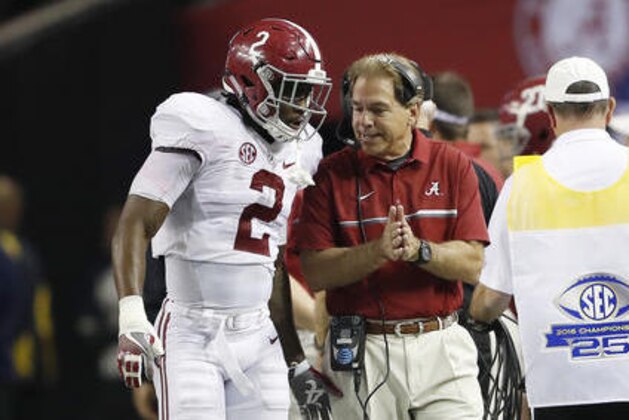 Alabama quarterback Jalen Hurts (2) speaks with Alabama head coach Nick Saban during the second half of the Southeastern Conference championship NCAA college football game between Alabama and Florida, Saturday, Dec. 3, 2016, in Atlanta.(AP Photo/John Bazemore)