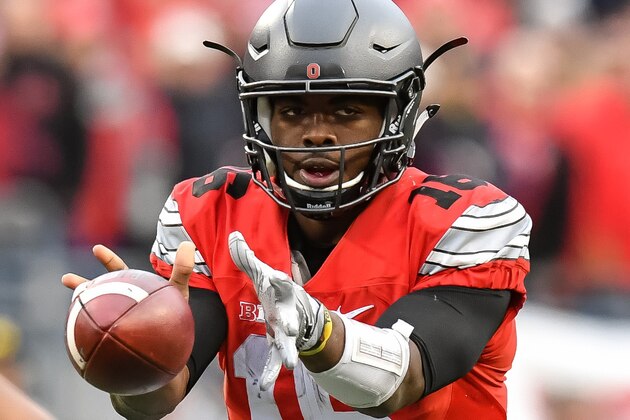 COLUMBUS, OH - NOVEMBER 26:  Quarterback J.T. Barrett #16 of the Ohio State Buckeyes takes the snap against the Michigan Wolverines at Ohio Stadium on November 26, 2016 in Columbus, Ohio. Ohio State defeated Michigan 30-27 in two overtimes.  (Photo by Jamie Sabau/Getty Images)