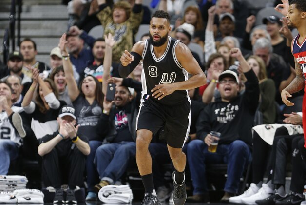 SAN ANTONIO,TX - DECEMBER 2: Fans reacts after a three by Patty Mills #24 of the San Antonio Spurs in game against the Washington Wizards at AT&T Center on December 2, 2016 in San Antonio, Texas.  NOTE TO USER: User expressly acknowledges and agrees that , by downloading and or using this photograph, User is consenting to the terms and conditions of the Getty Images License Agreement. (Photo by Ronald Cortes/Getty Images)