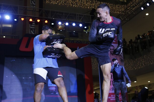 MANILA, PHILIPPINES - SEPTEMBER 17:  Max Holloway (R) holds an open workout session for media and fans with Mark Muoz (L) on September 17, 2016 at SM Megamall in Manila, Philippines.  (Photo by Jeoffrey Maitem/Zuffa LLC/Zuffa LLC via Getty Images)