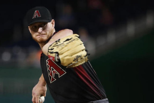 Arizona Diamondbacks starting pitcher Shelby Miller winds up during the first inning of a baseball game against the Washington Nationals in Washington, Wednesday, Sept. 28, 2016. (AP Photo/Manuel Balce Ceneta)