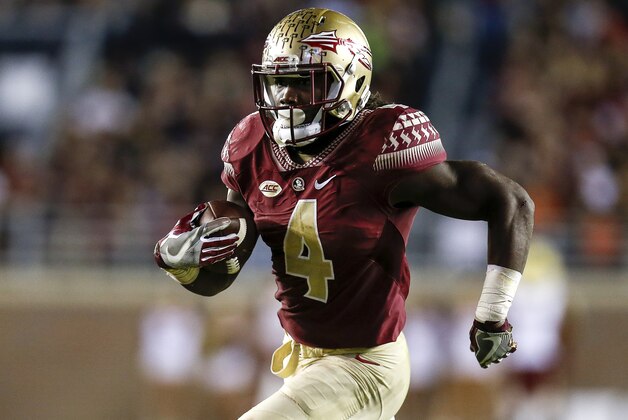 TALLAHASSEE, FL - NOVEMBER 11: Runningback Dalvin Cook #4 of the Florida State Seminoles on a running play during the game against the Boston College Eagles at Doak Campbell Stadium on Bobby Bowden Field on November 11, 2016 in Tallahassee, Florida. Florida State defeated Boston College 45 to 7. (Photo by Don Juan Moore/Getty Images)