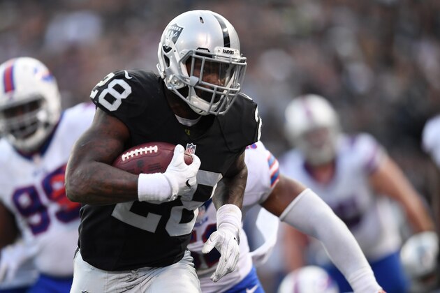 OAKLAND, CA - DECEMBER 04:  Latavius Murray #28 of the Oakland Raiders rushes for a touchdown against the Buffalo Bills during their NFL game at Oakland Alameda Coliseum on December 4, 2016 in Oakland, California.  (Photo by Thearon W. Henderson/Getty Images)