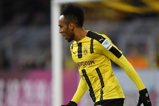 Dortmund's Pierre-Emerick Aubameyang reacts after scoring during the German Bundesliga soccer match between Borussia Dortmund and Borussia Moenchengladbach in Dortmund, Germany, Saturday, Dec. 3, 2016. (AP Photo/Martin Meissner)