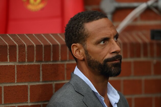 MANCHESTER, ENGLAND - AUGUST 03: Former Manchester United player Rio Ferdinand working for TV Broadcaster BT Sport during the Wayne Rooney Testimonial match between Manchester United and Everton at Old Trafford on August 3, 2016 in Manchester, England.  (Photo by Matthew Ashton - AMA/Getty Images)
