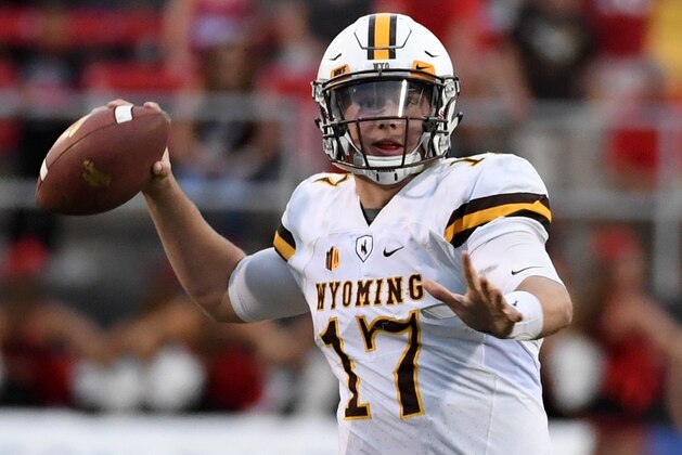 LAS VEGAS, NV - NOVEMBER 12:  Quarterback Josh Allen #17 of the Wyoming Cowboys throws against the UNLV Rebels during their game at Sam Boyd Stadium on November 12, 2016 in Las Vegas, Nevada. UNLV won 69-66 in triple overtime.  (Photo by Ethan Miller/Getty Images)