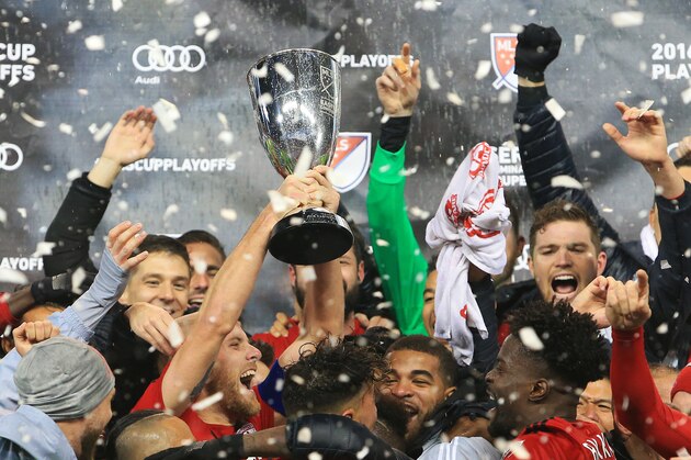 TORONTO, ON - NOVEMBER 30:  Michael Bradley #4 of Toronto FC and teammates celebrate with the Eastern Conference Trophy following victory in the MLS Eastern Conference Final, Leg 2 game against Montreal Impact at BMO Field on November 30, 2016 in Toronto, Ontario, Canada.  (Photo by Vaughn Ridley/Getty Images)