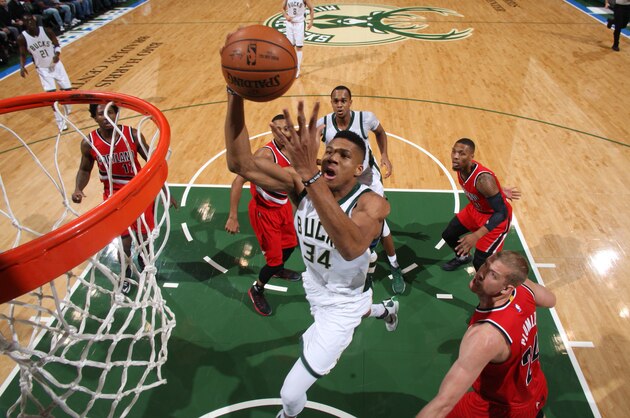 Milwaukee, WI - DECEMBER 7: Giannis Antetokounmpo #34 of the Milwaukee Bucks shoots the ball against the Portland Trail Blazers on December 7, 2016 at the BMO Harris Bradley Center in Milwaukee, Wisconsin. NOTE TO USER: User expressly acknowledges and agrees that, by downloading and or using this Photograph, user is consenting to the terms and conditions of the Getty Images License Agreement. Mandatory Copyright Notice: Copyright 2016 NBAE (Photo by Gary Dineen/NBAE via Getty Images)