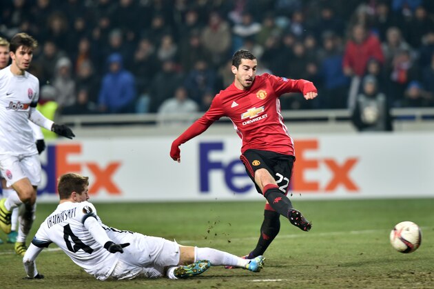 Manchester United's Armenian midfielder Henrikh Mkhitaryan kicks to score a goal during the UEFA Europa League football match between FC Zorya Luhansk and Manchester United FC at the Chornomorets stadium in Odessa on December 8, 2016 / AFP / Sergei SUPINSKY        (Photo credit should read SERGEI SUPINSKY/AFP/Getty Images)