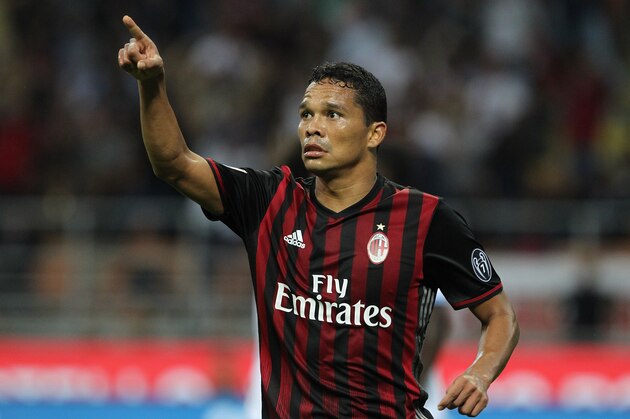MILAN, ITALY - SEPTEMBER 20:  Carlos Bacca of AC Milan celebrates after scoring the opening goal during the Serie A match between AC Milan and SS Lazio at Stadio Giuseppe Meazza on September 20, 2016 in Milan, Italy.  (Photo by Marco Luzzani/Getty Images)