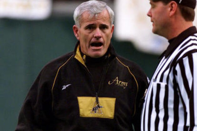 FILE - In this Dec. 5, 1999,  file photo, then-Army football coach Bob Sutton approaches a referee during the Army-Navy game in Philadelphia. Despite the recent lopsidedness of the fierce Army-Navy rivalry _ the Middies have won 14 straight _ Sutton says nothing is a given when these two teams play.  (AP Photo/Rusty Kennedy, File)