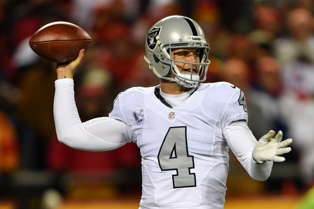 KANSAS CITY, MO - DECEMBER 8: Quarterback Derek Carr #4 of the Oakland Raiders throws a pass against the Kansas City Chiefs at Arrowhead Stadium during the first quarter of the game on December 8, 2016 in Kansas City, Missouri. (Photo by Peter Aiken/Getty Images)