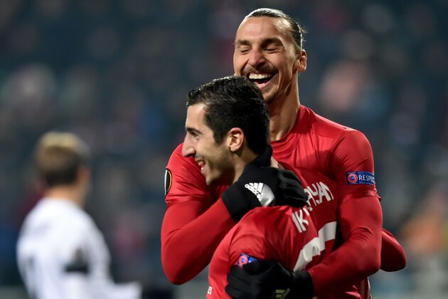 Manchester United's Armenian midfielder Henrikh Mkhitaryan (L) celebrates after scoring a goal, with teammate Swedish forward Zlatan Ibrahimovic during the UEFA Europa League football match between FC Zorya Luhansk and Manchester United FC at the Chornomorets stadium in Odessa on December 8, 2016 / AFP / Sergei SUPINSKY        (Photo credit should read SERGEI SUPINSKY/AFP/Getty Images)
