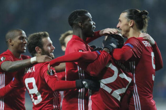 Manchester United's from left, Eric Bailly, Juan Mata, Paul Pogba, Henrikh Mkhitaryan and Zlatan Ibrahimovic celebrate after their first goal during the Europa League group A soccer match between Manchester United and Zorya Luhansk at Chornomorets stadium in Odessa, Ukraine, Thursday, Dec. 8, 2016. (AP Photo/Efrem Lukatsky)