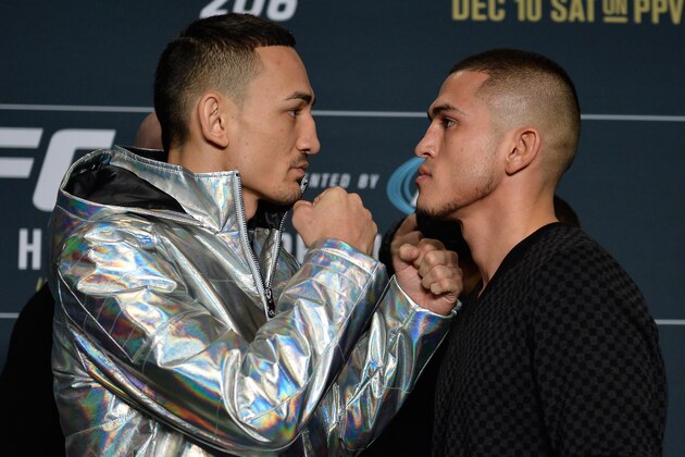 TORONTO, CANADA - DECEMBER 08:  (L-R) Max Holloway and Anthony Pettis face off during the UFC 206 Ultimate Media Day event inside the Westin Harbour Castle Hotel on December 8, 2016 in Toronto, Ontario, Canada. (Photo by Brandon Magnus/Zuffa LLC/Zuffa LLC via Getty Images)